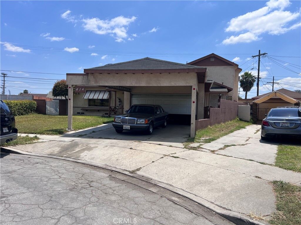 Property Photo:  414 E 137th  CA 90061 
