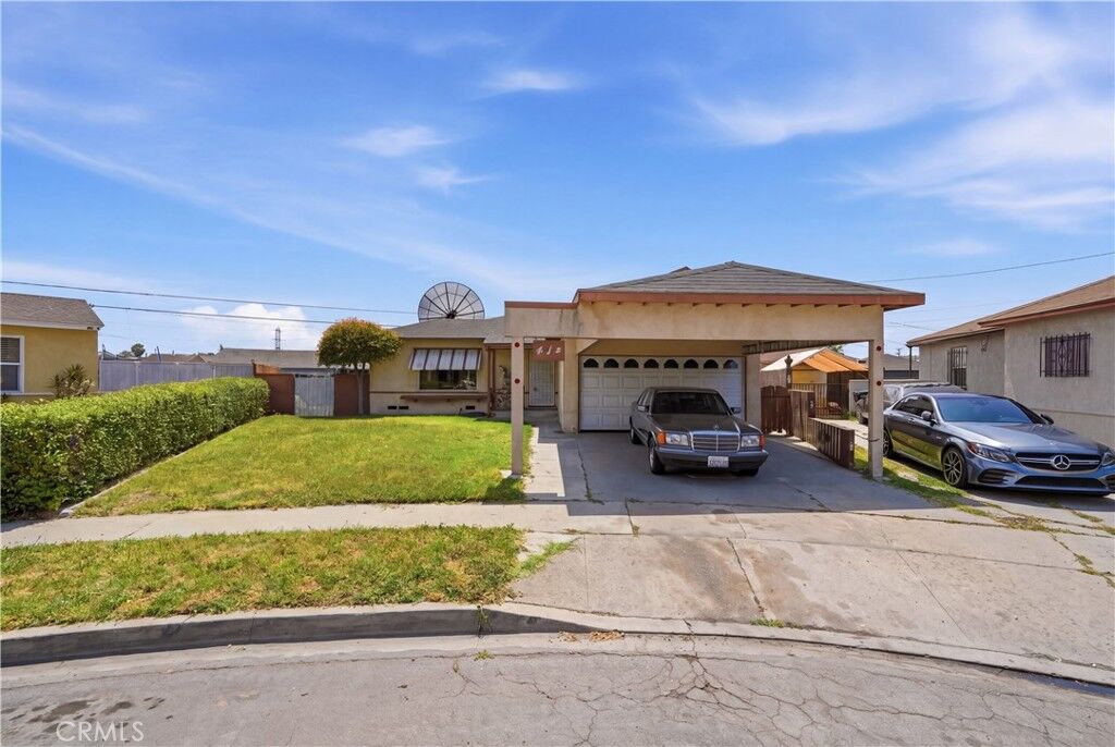 Property Photo:  414 E 137th  CA 90061 