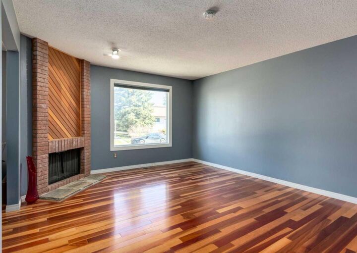 Property Photo:  223 Cedarwood Road SW  AB T2W 3G8 