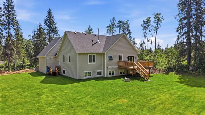 Property Photo: 1-260077 Twp Rd 422 AB T4J 1R3