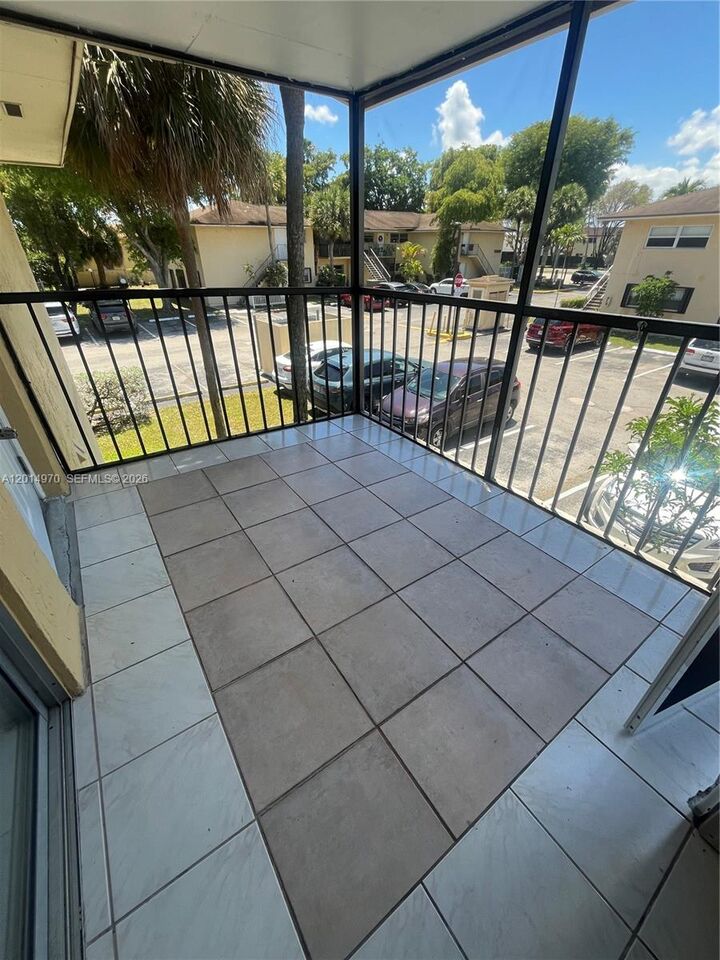 Property Photo:  15609 SW 73rd Cir Ter 8-12  FL 33193 
