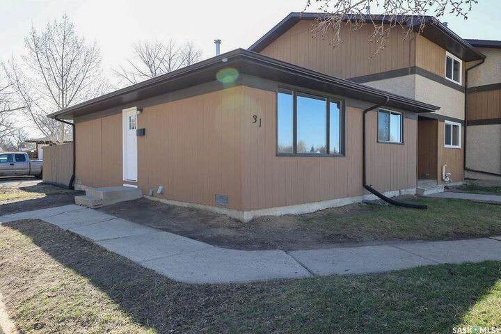 Property Photo: 31 Mackenzie Way SK S4N 5M7