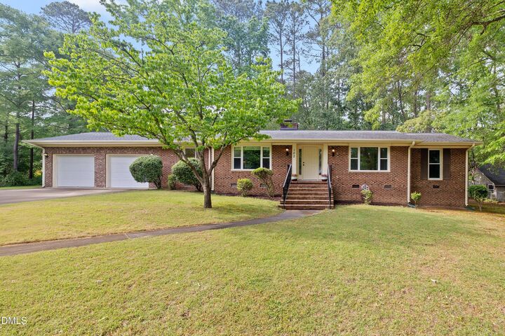 Property Photo: 102 Olmstead Court NC 27529