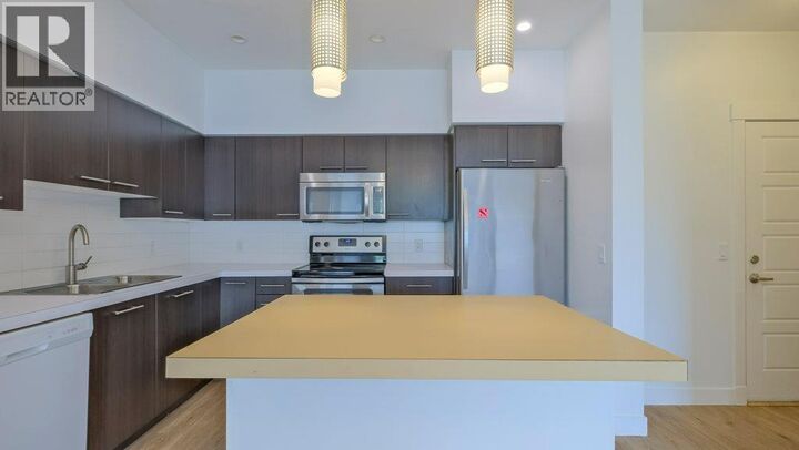 Property Photo:  985 Academy Way 101  BC V1V 3C8 