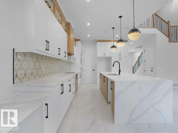 Property Photo:  6129 Crawford Drive SW  AB T6W 4L8 