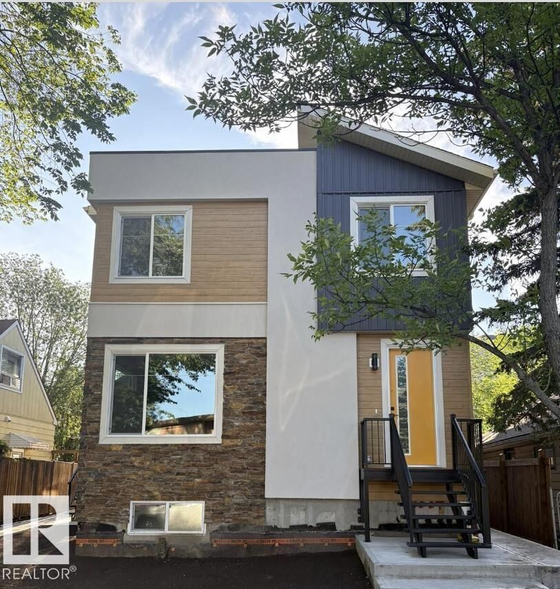 Property Photo:  10617/19/21 83 Street NW  AB T6A 3P6 