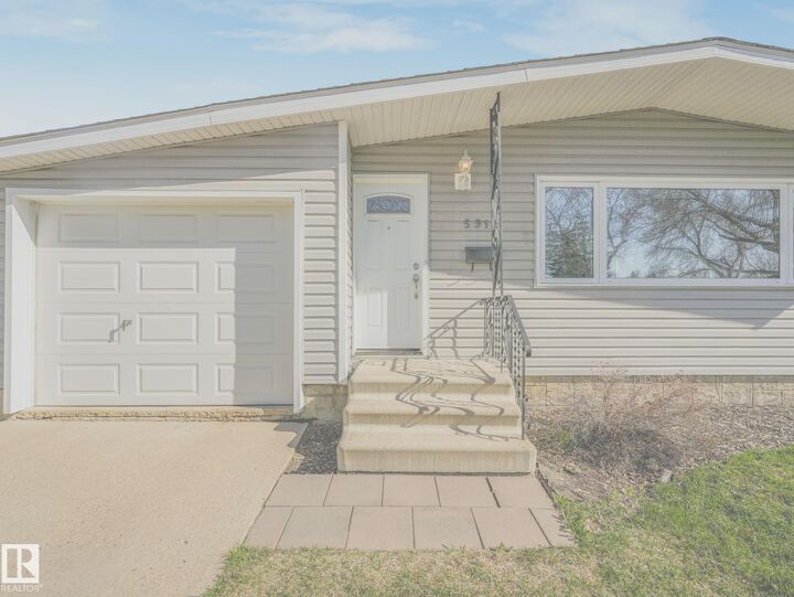 Property Photo:  5916 148 Avenue NW  AB T5A 1T9 