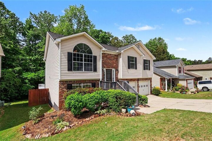 Property Photo:  5687 Wellborn Oaks Court  GA 30058 