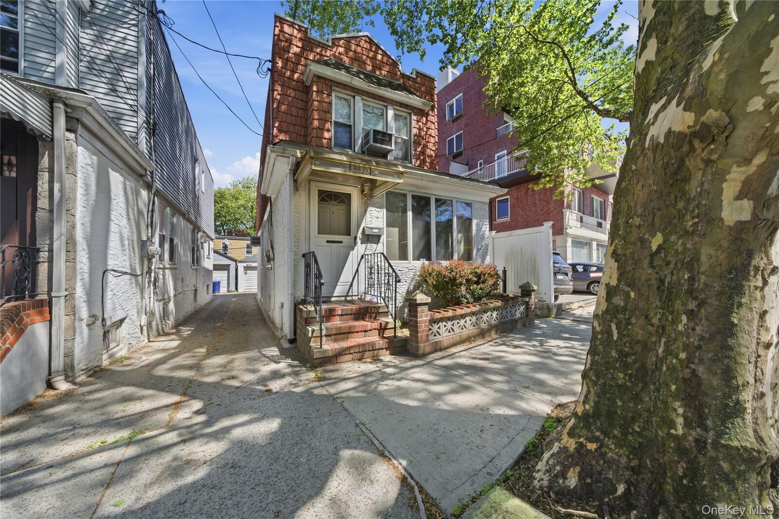 Property Photo:  66-71 70th Street  NY 11379 