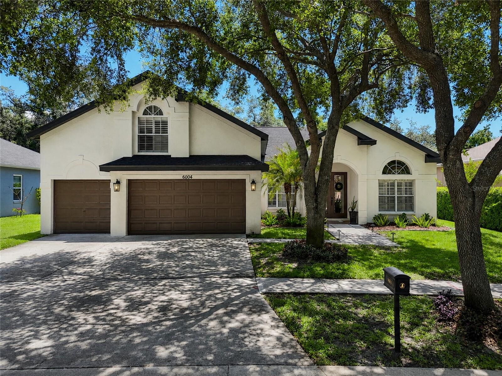 Property Photo:  6004 Merlinwood Drive  FL 33547 