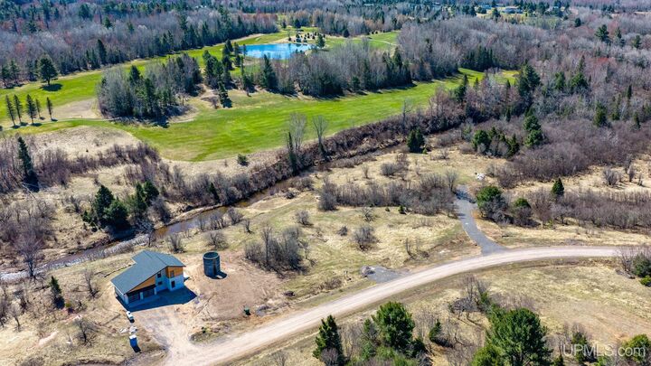 Property Photo:  22089 River Trails Road  MI 49931 