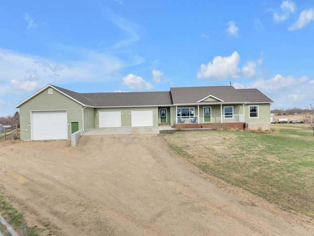 Property Photo:  1 -251061 Township Road 431A  AB T4J 1R1 