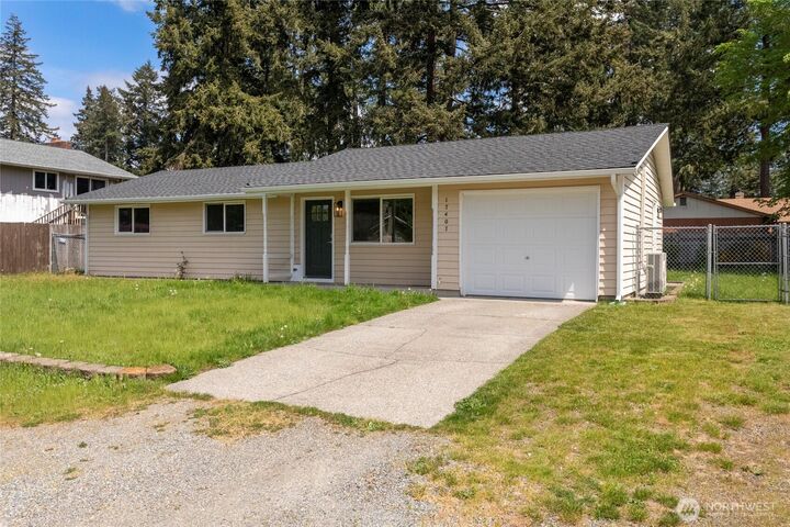 Property Photo:  17407 E 11th Ave  WA 98387 