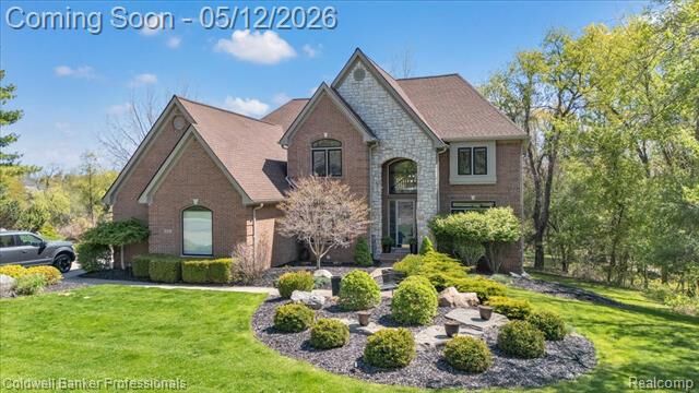 Property Photo:  1445 Wood Trail  MI 48371 