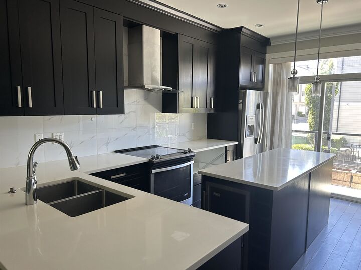 Property Photo: 13670 62 Avenue 50 BC V3X 0H8