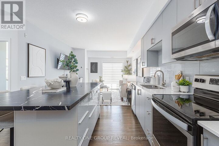 Property Photo:  290 Liberty Street North 417  ON L1C 0V5 