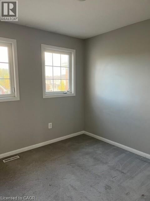 Property Photo:  77 Abbott Crescent  ON N3C 0C9 