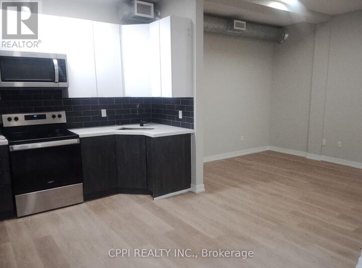 Property Photo:  140 Simcoe Street 223  ON K9H 0K5 