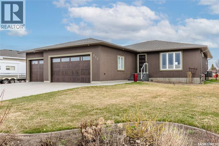 Property Photo:  212 Iron Bridge Drive  SK S6J 0B5 