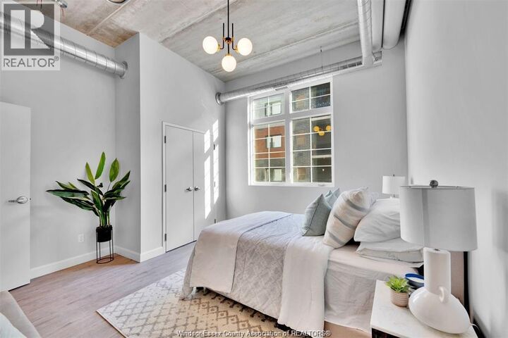 Property Photo:  11941 Tecumseh Road East 402  ON N8N 1L8 