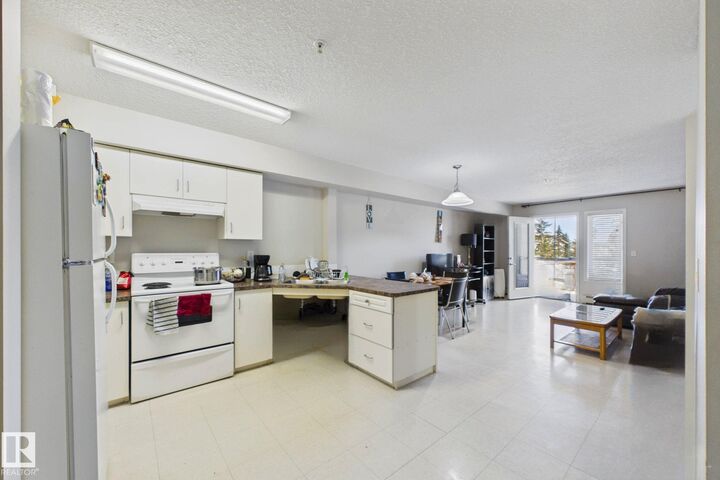 Property Photo:  80A Kelloway Crescent 220  AB T4P 4G7 