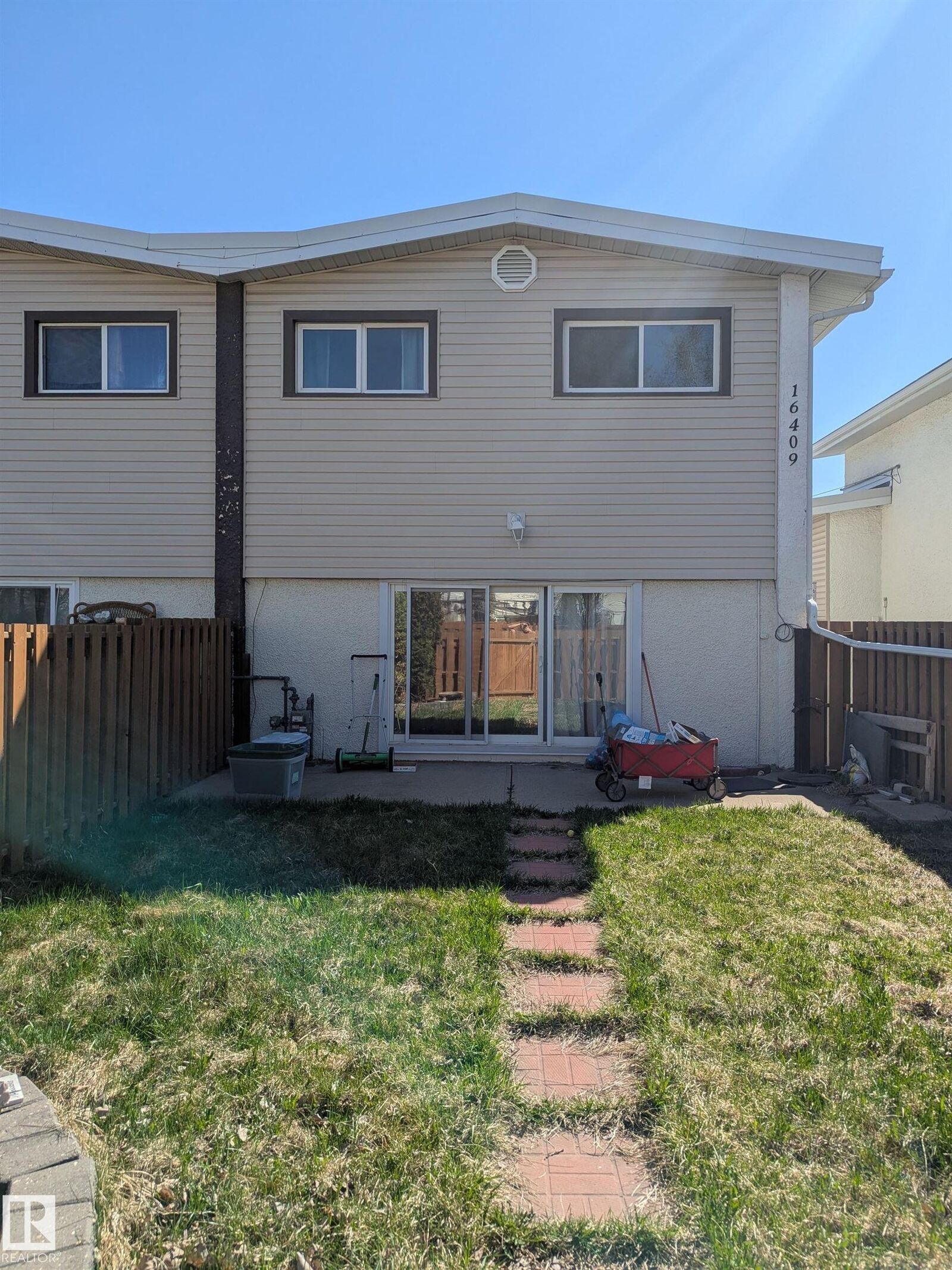 Property Photo:  16409 89 Avenue NW F  AB T5R 4S1 