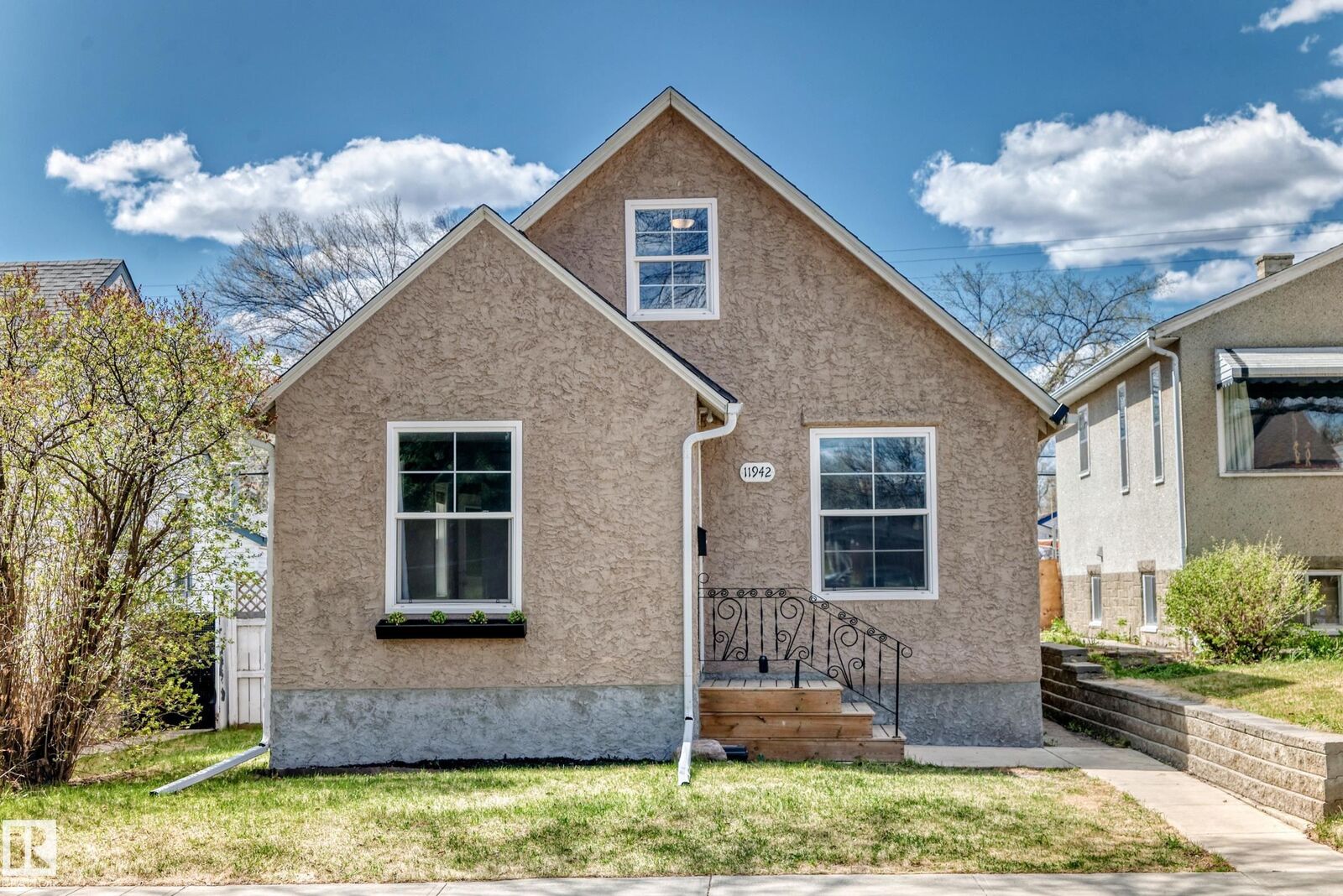 Property Photo:  11942 62 Street NW  AB T5W 4C6 