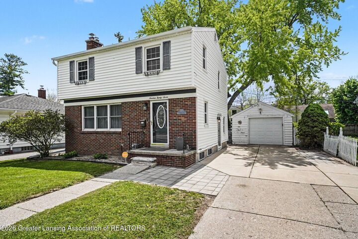Property Photo:  1927 Cooper Avenue  MI 48910 