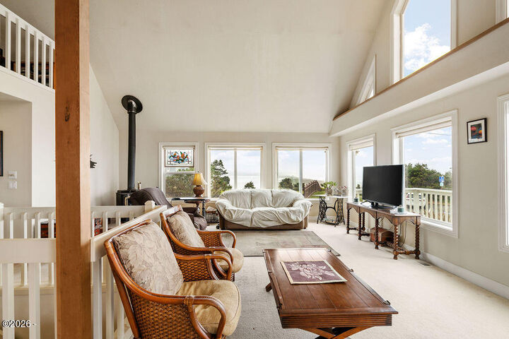 Property Photo:  4912 SW Beach Avenue  OR 97367 