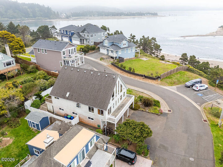 Property Photo:  4912 SW Beach Avenue  OR 97367 