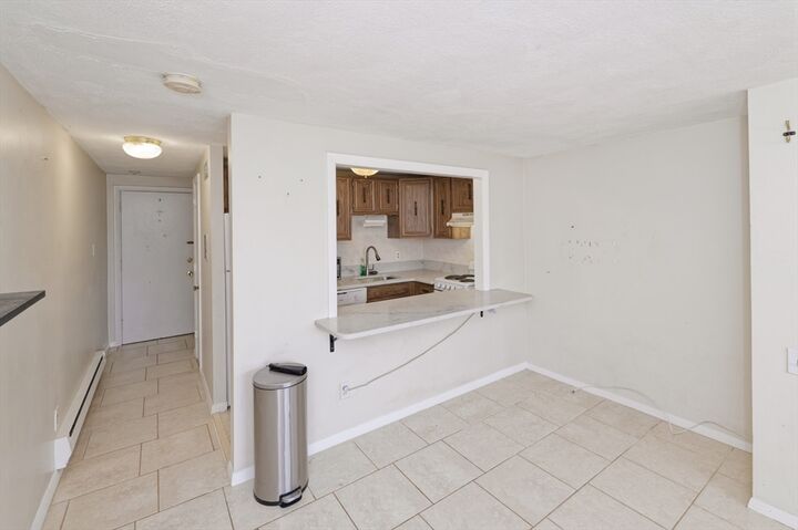 Property Photo:  608 Boston Post Rd E 21  MA 01752 