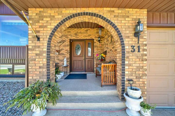 Property Photo:  31 Red Crow Boulevard W  AB T1K 5J7 