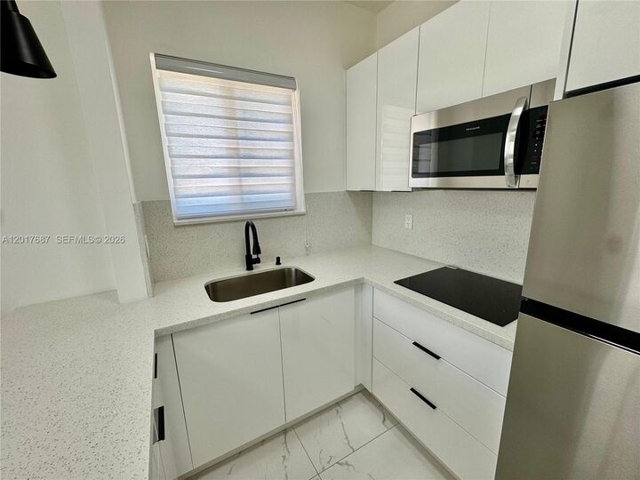 Property Photo:  421 NW 13th Ave A  FL 33125 