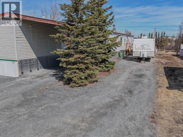 Property Photo:  6207 Finlayson Drive North  NT X1A 3K9 