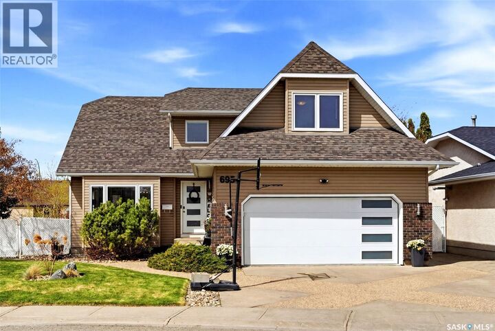Property Photo:  6954 Maple Brook Crescent  SK S4X 4J2 
