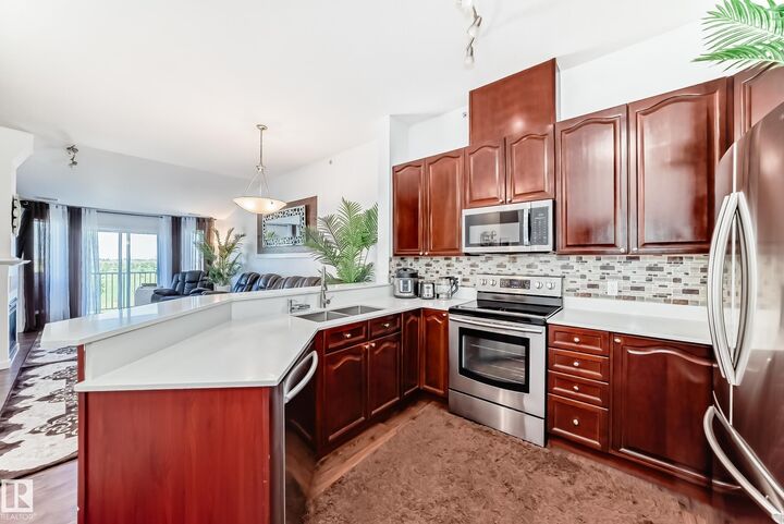 Property Photo:  4312 139 Avenue NW 412  AB T5Y 3J4 