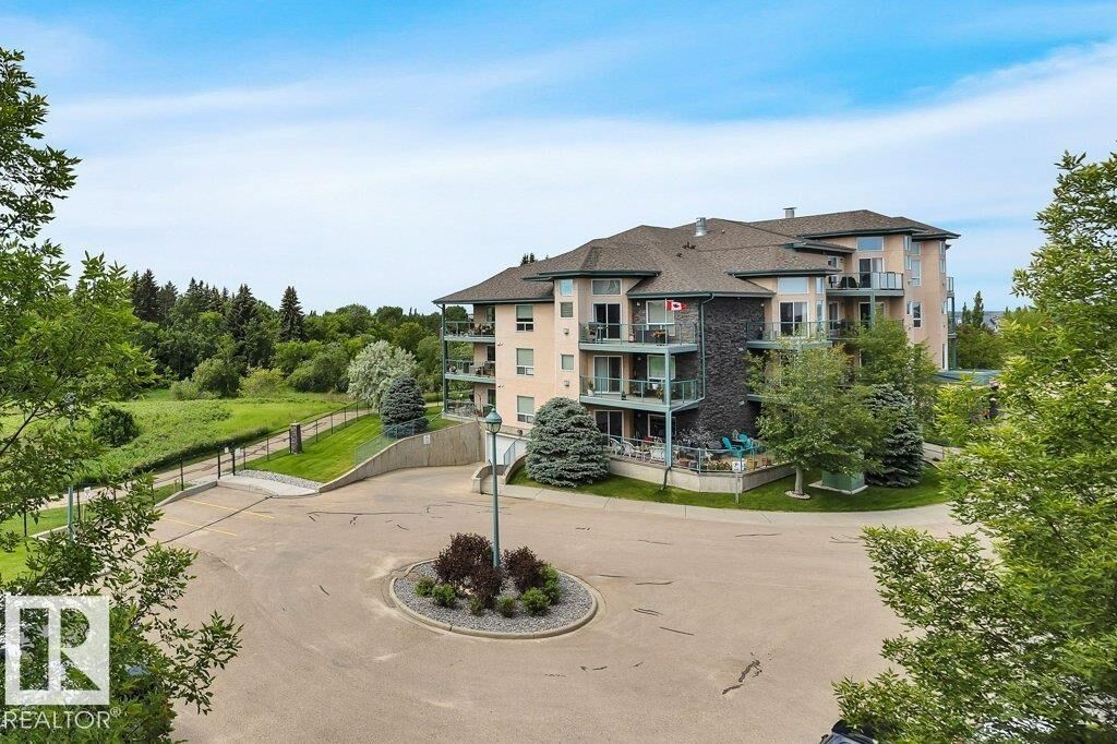 Property Photo:  102A Bridgeport Crossing 302  AB T9E 8K8 