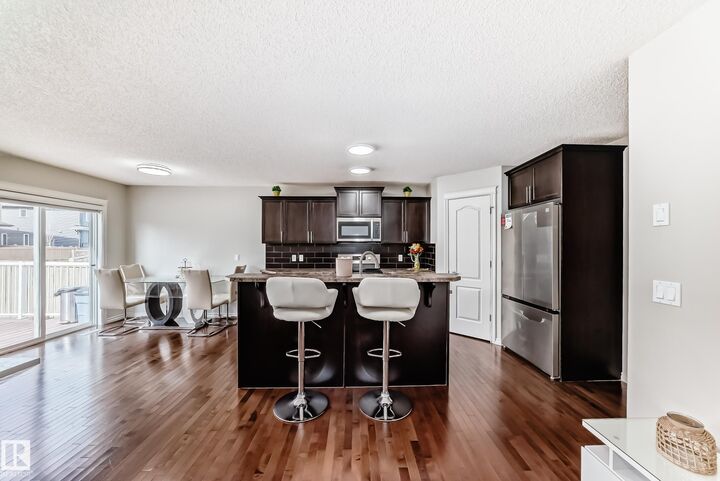 Property Photo:  6419 18 Ave SW SW  AB T6X 0M9 