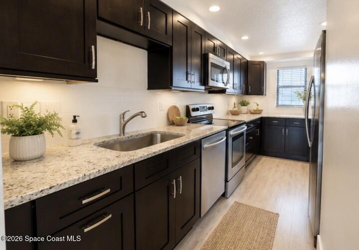 Property Photo:  500 Palm Springs Boulevard  FL 32937 