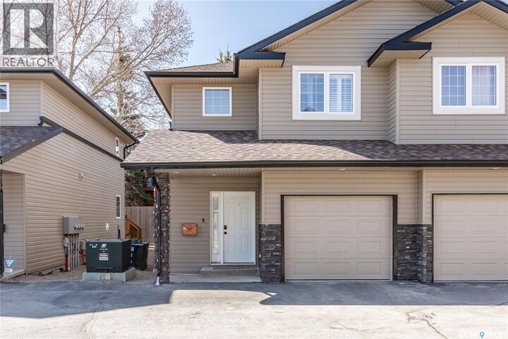 Property Photo:  B4 33 Wood Lily Drive  SK S6J 1E6 