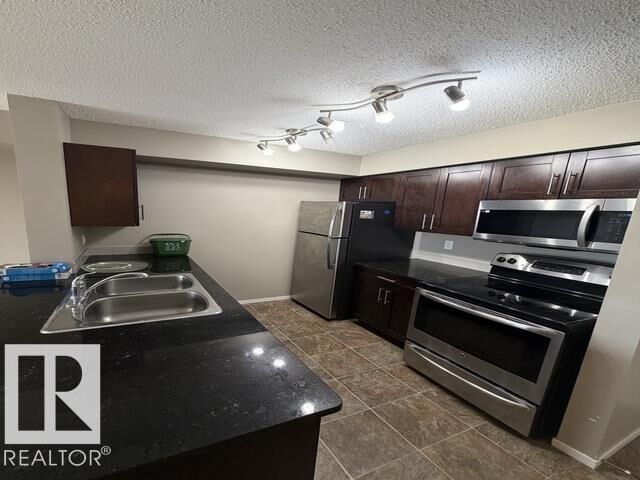 Property Photo:  321 107 Watt Common SW  AB T6X 2C6 