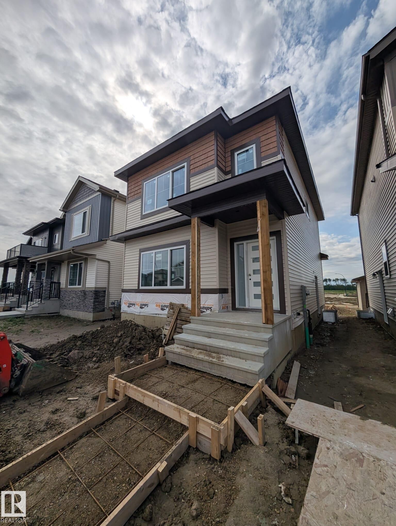 Property Photo: 348 Roberts Wynd AB T9E 1P8
