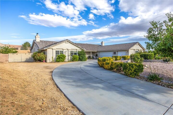 Property Photo:  13997 Riverside  CA 92307 