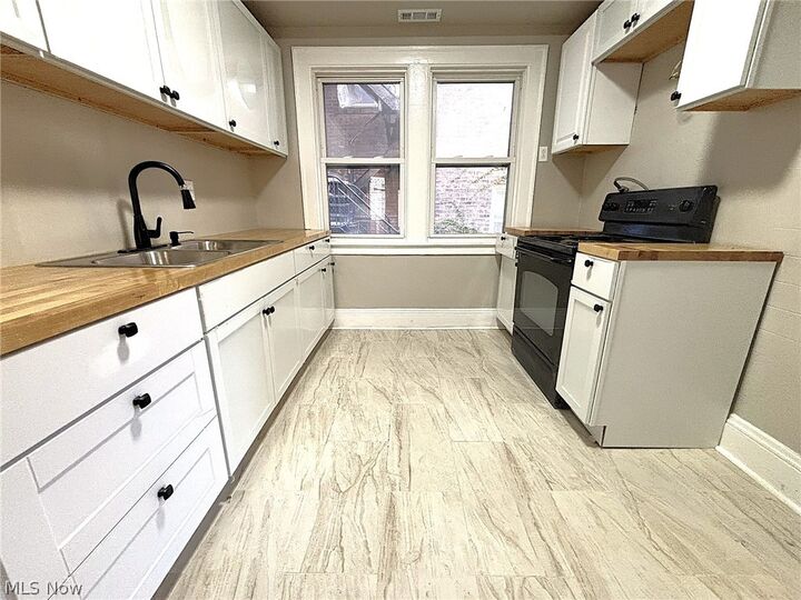 Property Photo:  14172 Superior Road  OH 44118 