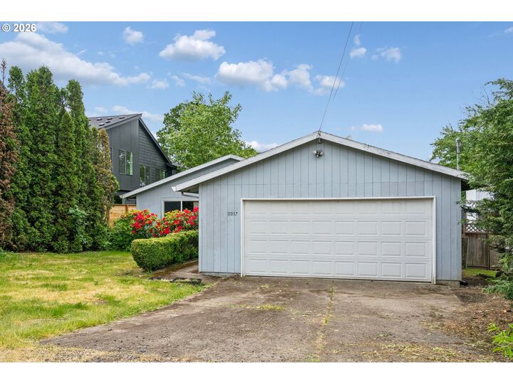 Property Photo:  11037 SW 61st Ave  OR 97219 