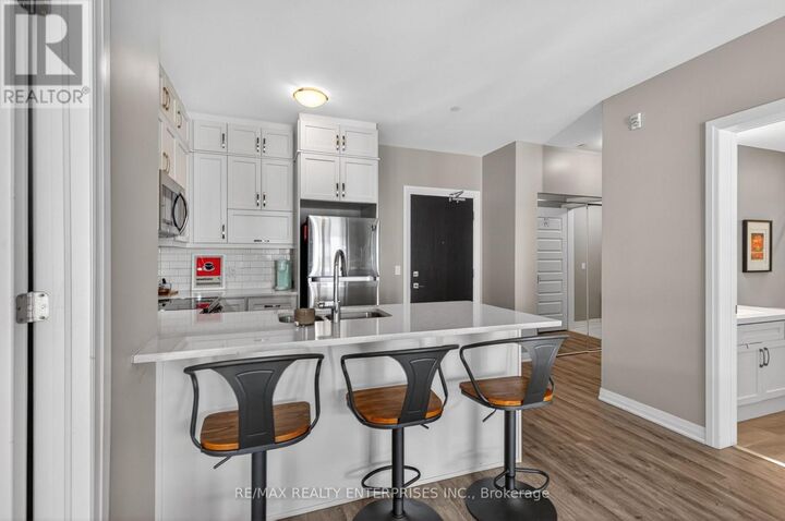 Property Photo:  102 Grovewood Common 510  ON L9H 0X2 