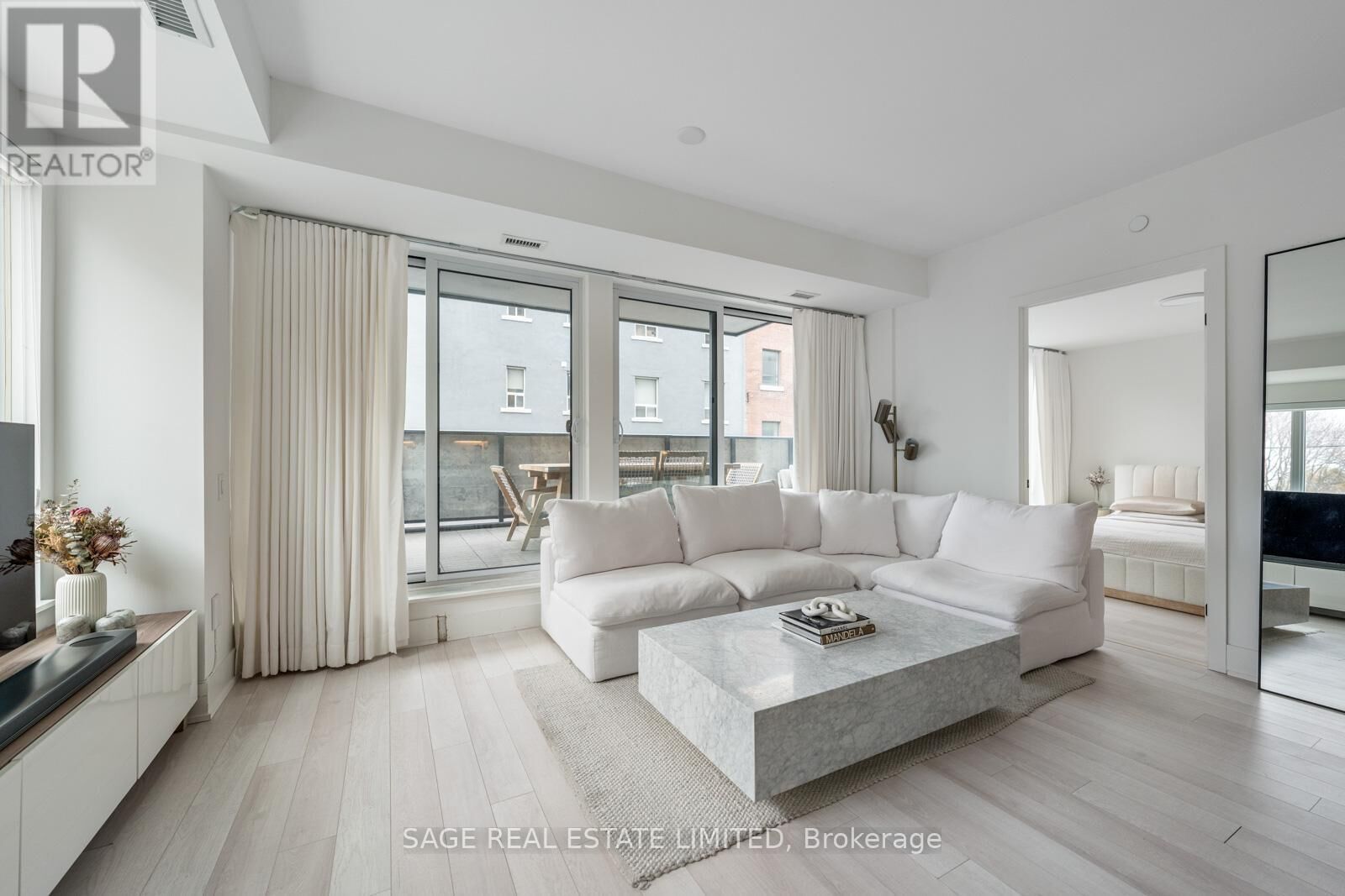 Property Photo: 1888 Queen Street East 206 ON M4L 1H3