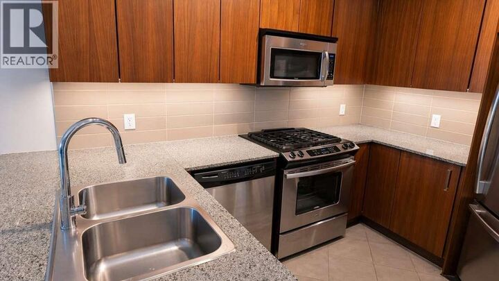 Property Photo:  5889 Irmin Street 405  BC V5J 0C1 