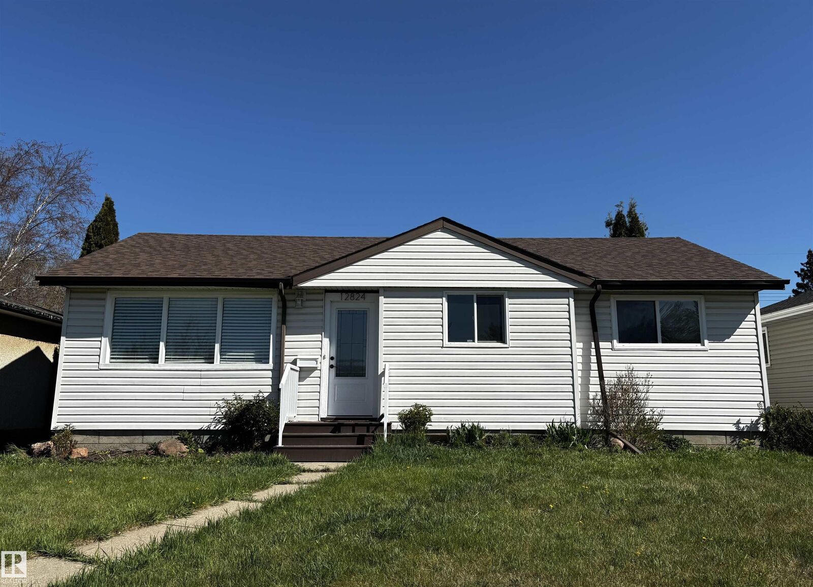 Property Photo:  12824 134 Avenue NW  AB T5L 3V5 