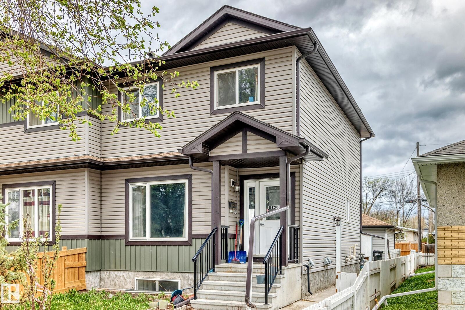 Property Photo:  12833 123 Street NW 1  AB T5L 0J4 